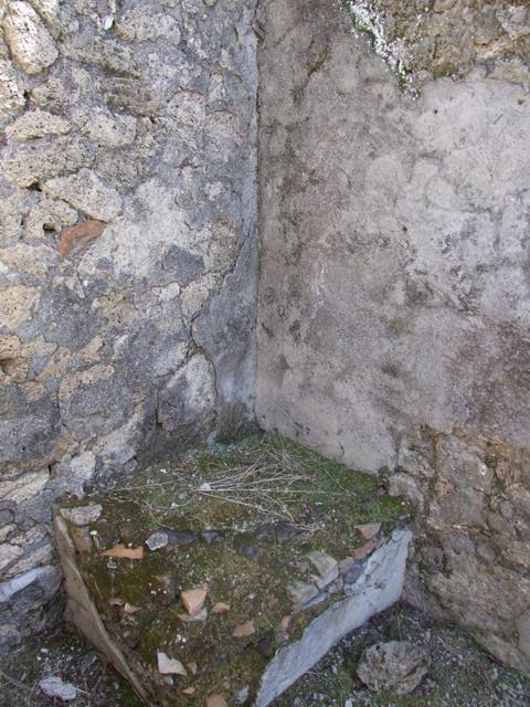I.12.15 Pompeii. March 2009. East wall outside room 6.