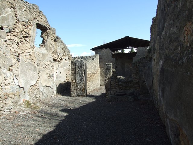 I.12.15 Pompeii.  March 2009. Steps to outside Triclinium, at east end of corridor.