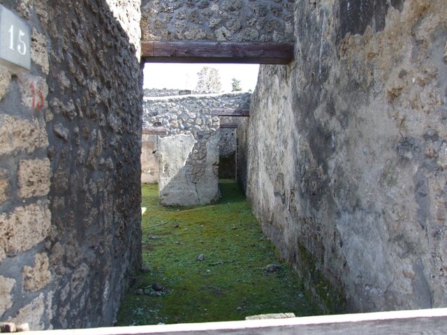 I.13.15 Pompeii. March 2009. Doorway to Room on north side of entrance. Looking west.