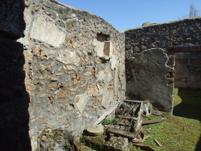 I.13.15 Pompeii. March 2009. Room on north east side of central courtyard, looking towards south wall.