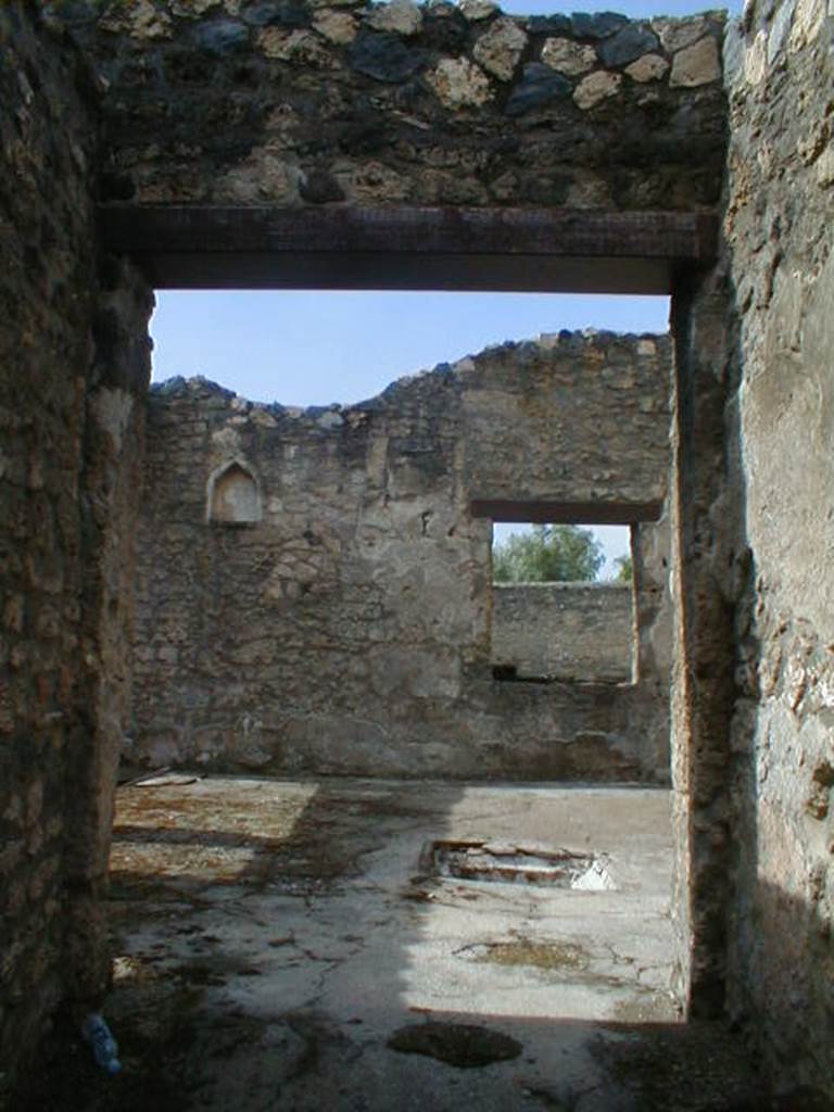 I.14.2 Pompeii. May 2006. Looking west from entrance A to atrium B with impluvium.