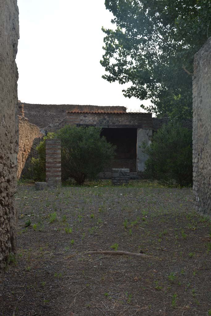 II.1.12 Pompeii. July 2017. 
Looking east from entrance doorway towards wide west doorway of sacellum/oecus.
Foto Annette Haug, ERC Grant 681269 DÉCOR.

