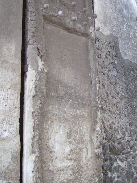 II.2.2 Pompeii.  March 2009.  Door to room 3 on west side of atrium.