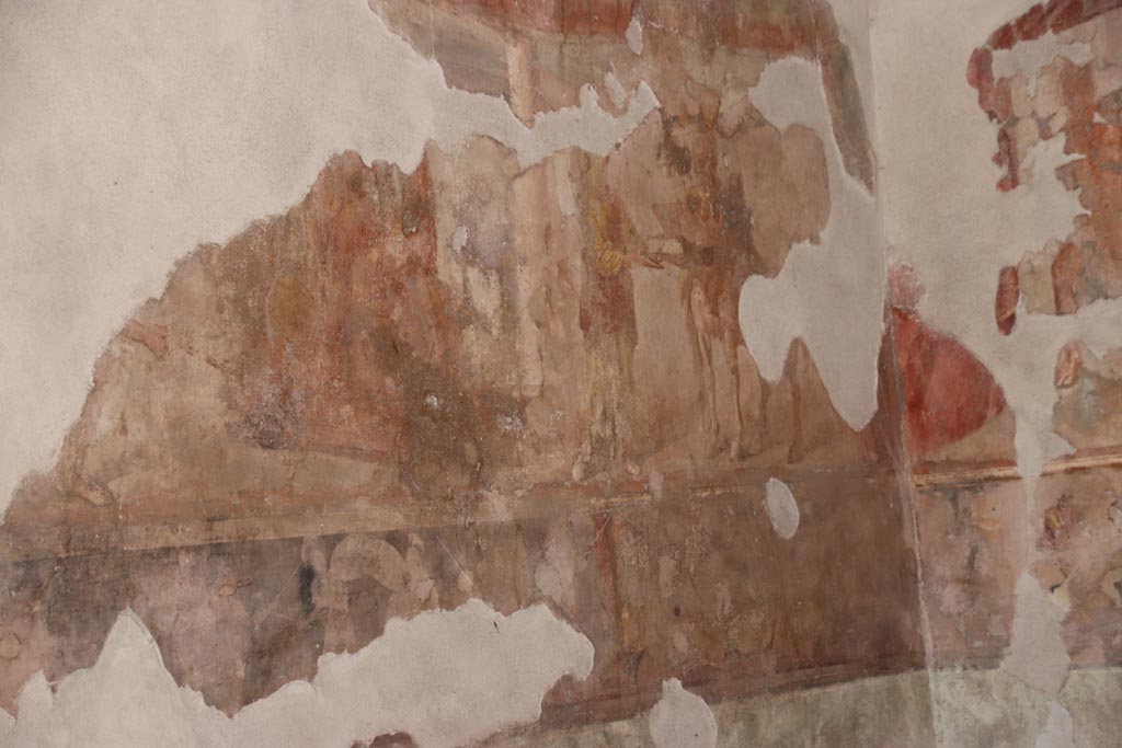 II.2.2 Pompeii. October 2022. Triclinium “h”, detail from north end of west wall. Photo courtesy of Klaus Heese