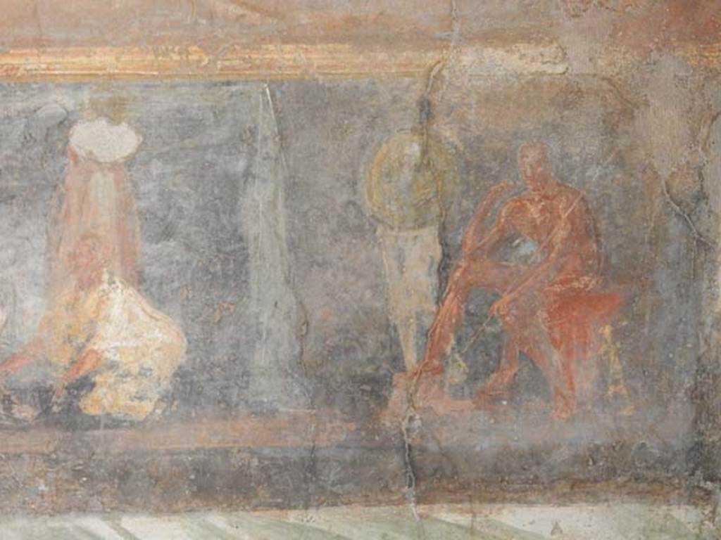 II.2.2 Pompeii. May 2016. Room “h”, south end of east wall. 
In his tent a naked Achilles sits in thoughtful pose, sceptre in his left hand and his sword leaning against his seat. Patroclus, fully armed, is next to him.
See Lorenz K., 2013. In Epic Visions: Visuality in Greek and Latin Epic and its Reception. Cambridge U.P., p. 235-6.
Photo courtesy of Buzz Ferebee.

