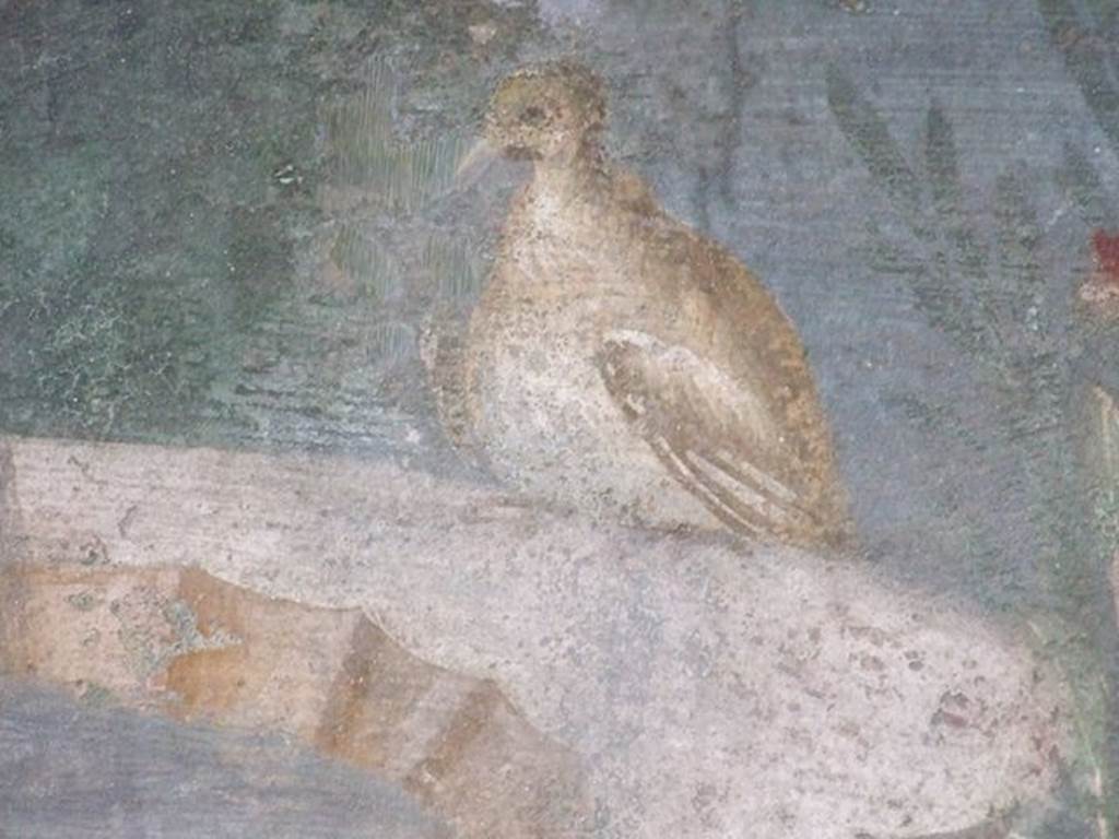 II.3.3 Pompeii. December 2006. Room 11, west panel of south wall of peristyle. Detail of wall painting of bird on edge of fountain.
