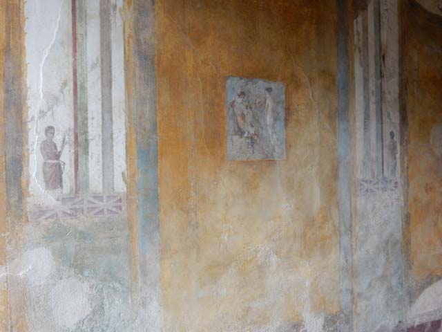 II.3.3 Pompeii. December 2005. Room 9, Oecus. North wall. Painting of figure in architectural setting.