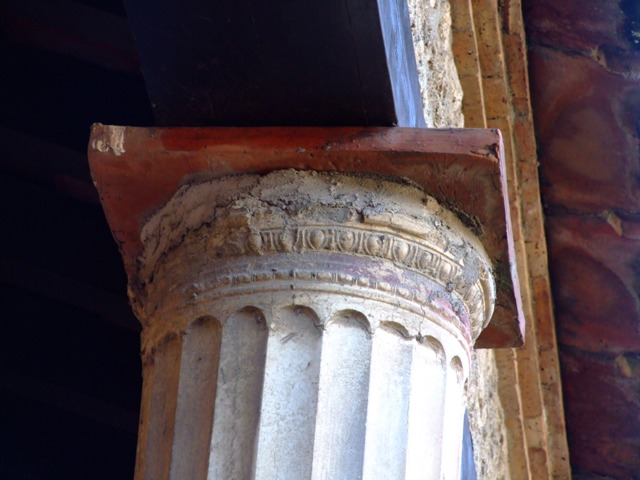 II.3.3 Pompeii. March 2009. Room 11, West Portico. Painted decoration above Doorway to Room 13.