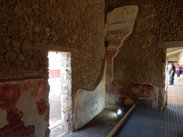 II.4.3 Pompeii. May 2016. Doorway to II.4.4 in south-east corner of atrium, with doorway to west portico, on right. Photo courtesy of Buzz Ferebee.
