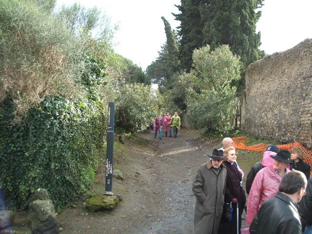 Pompeii. December 2004.  Vicolo dell’Anfiteatro looking south towards II.4.8, on right.

