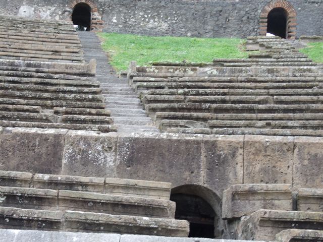 II.6 Pompeii Amphitheatre.    Steps near South West Exit.