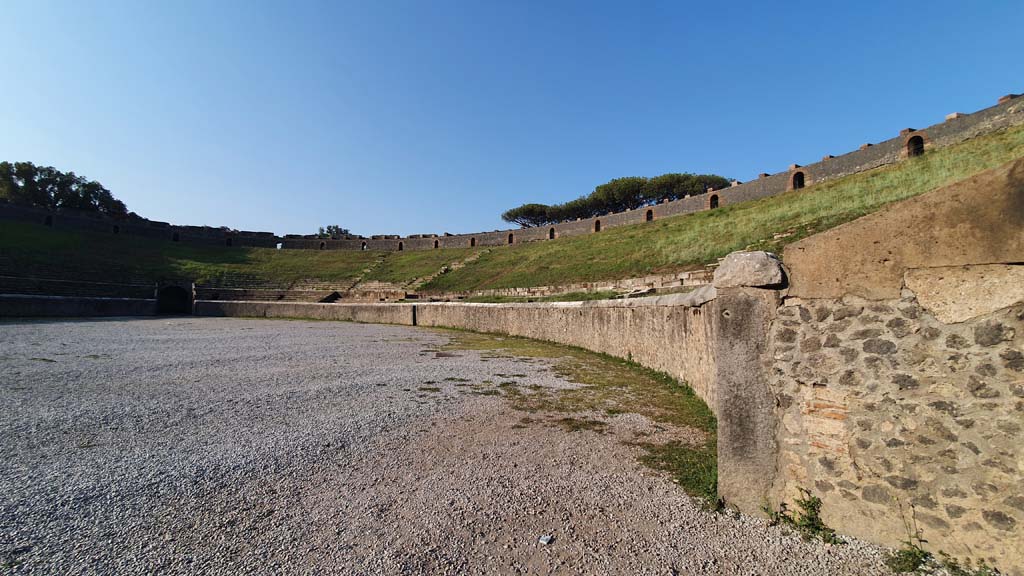 II.6 Pompeii. December 2018. Looking towards south end of arena and seating of amphitheatre. Photo courtesy of Aude Durand.