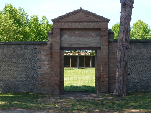 II.7.2 Pompeii. Palaestra. March 2009. Looking across entrance II.7.2 from top of amphitheatre.