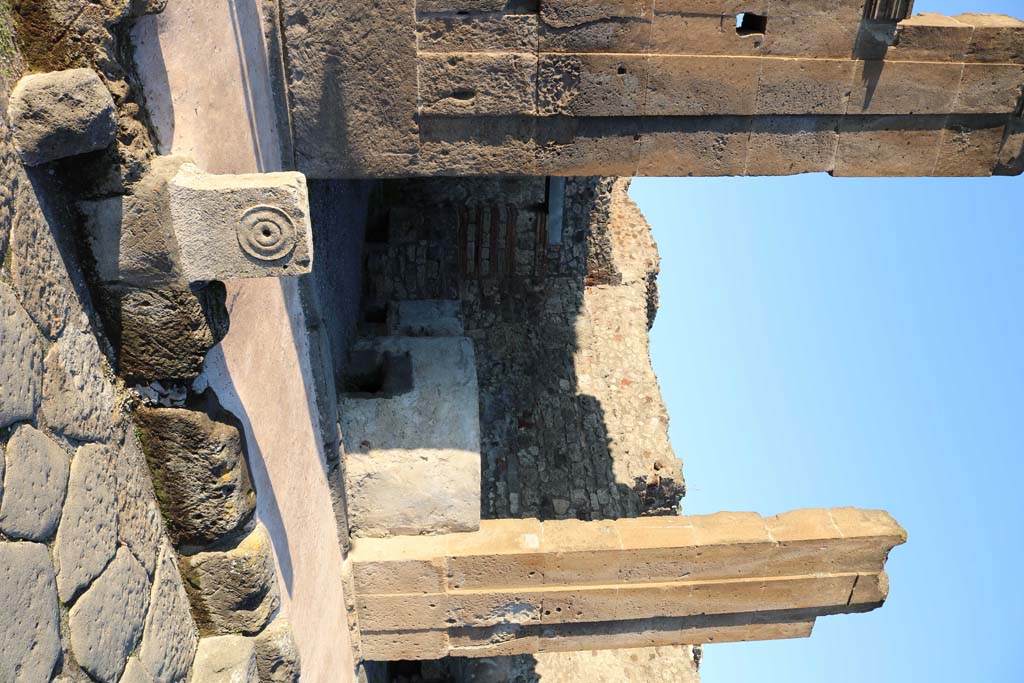 V.1.4 Pompeii. May 2010. Two large renovated boilers or kettles on east side.