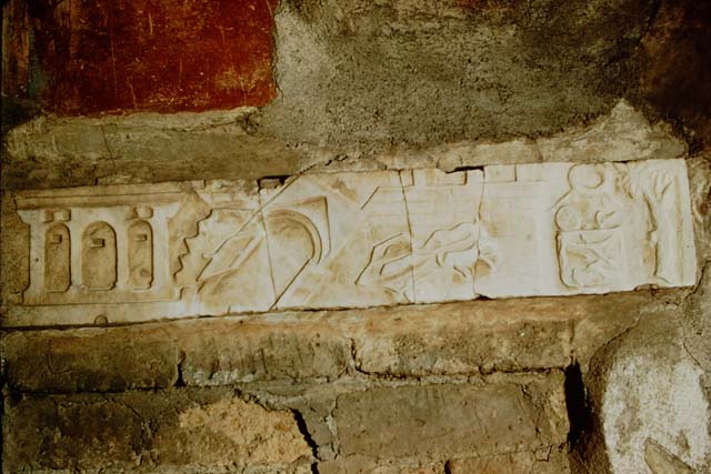 V.1.26 Pompeii. 1968. Domus L. Caecili Iucundi, Lararium earthquake frieze.  Photo courtesy of Anne Laidlaw.
American Academy in Rome, Photographic Archive. Laidlaw collection _P_68_9_4.
