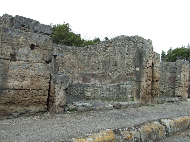 V.2.13 Pompeii. March 2009. South-west corner of thermopolium, and base of stairs to upper floor.