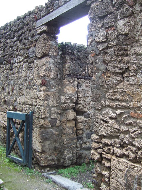 Pompeii. December 2005. Blocked door in the wall between V.2.a and V.2.b.