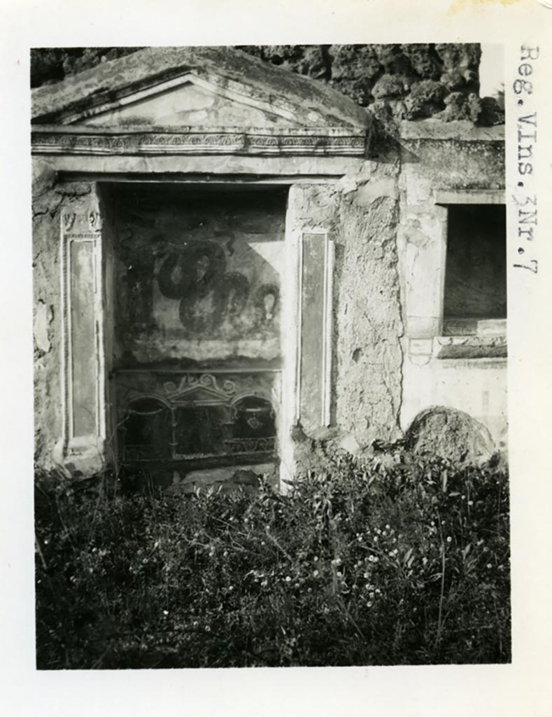 V.3.7 Pompeii. Pre-1937-39. Looking towards west wall of the garden area with aedicule lararium and niche. 
Photo courtesy of American Academy in Rome, Photographic Archive. Warsher collection no. 1582.
