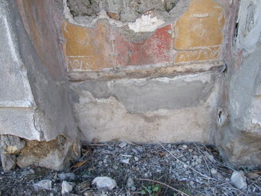 V.3.7 Pompeii. March 2009. Lararium on west wall of garden area. Marks of lower partition that formed the floor of the lararium.
