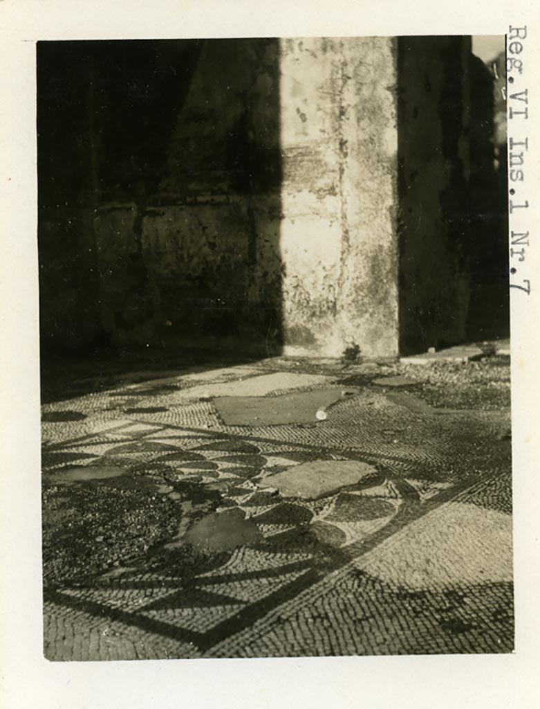 VI.1.6 Pompeii but numbered on photo as VI.1.7. Pre-1937-39. Looking across mosaic in centre of floor.
The door to the atrium of VI.1.7 can be seen in the upper right. 
Photo courtesy of American Academy in Rome, Photographic Archive. Warsher collection no. 1314.
