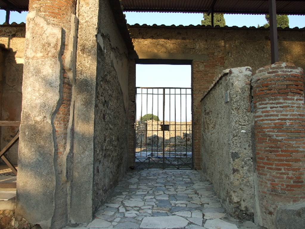 VI.1.7 Pompeii. December 2007. Entrance doorway, looking east.