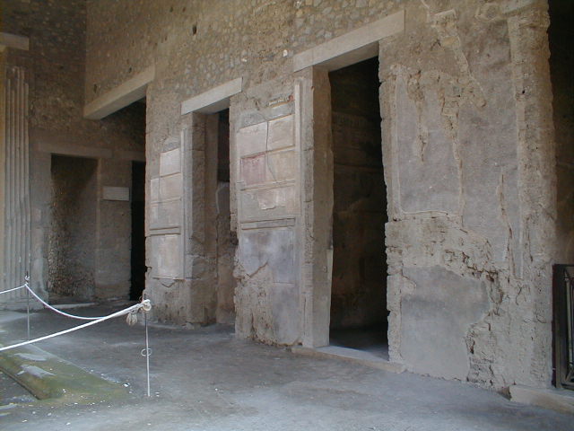 VI.2.4 Pompeii. June 2010. Rebuilt walled stairwell for the wooden stair. According to Anne Laidlaw, this used to have sockets that were the only evidence left for the wooden stair leading up from the exterior of the last cubiculum on the left of the atrium into the upper floor of that room. These have now been lost in the rebuilding. Photo courtesy of Rick Bauer.