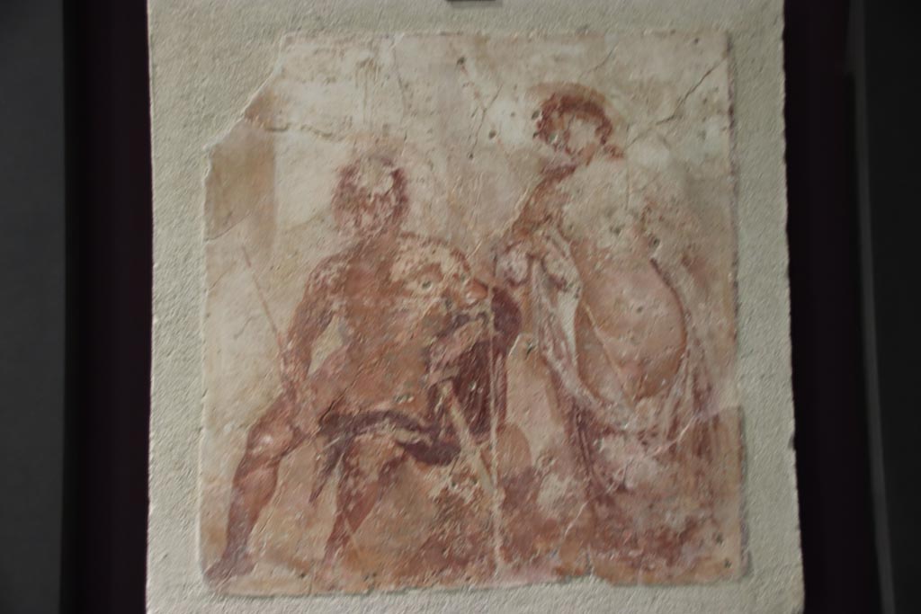 VI.2.22 Pompeii. October 2022. 
Wall painting from centre of south wall of tablinum, Meleager and Atalanta, lovers resting after the hunt of the Calydonian boar.
Photo courtesy of Klaus Heese.
