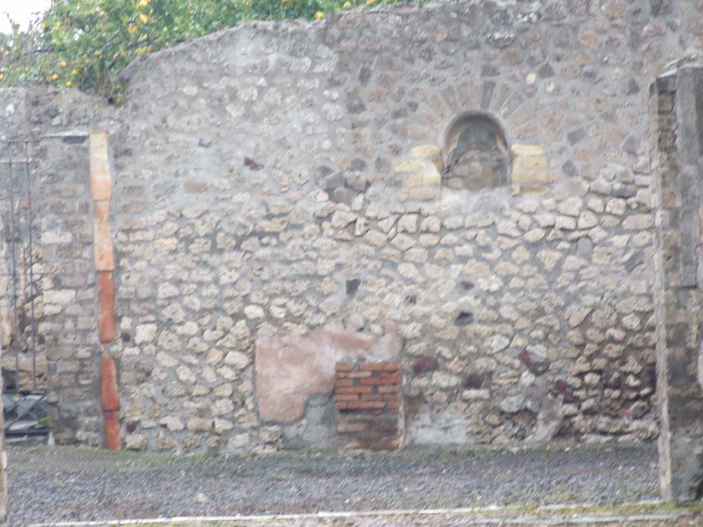 VI.3.7 Pompeii. December 2007. Niche and altar on east wall of garden area.