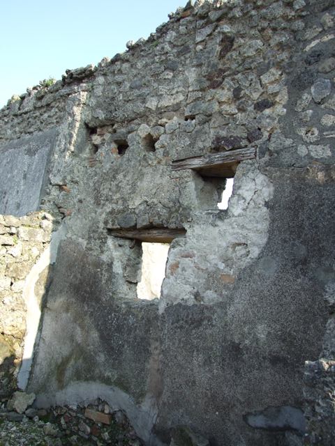 VI.7.6 Pompeii. March 2009. Room 6, looking east across garden area towards window of the triclinium.