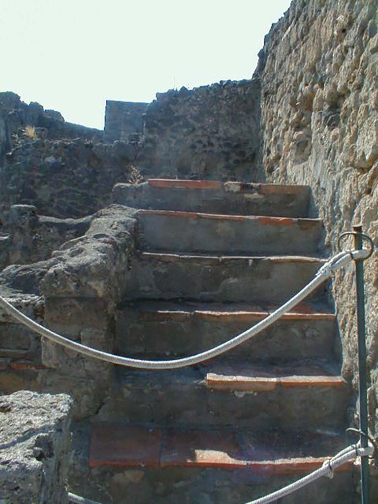 VI.7.17 Pompeii. September 2004. Steps to upper floors.