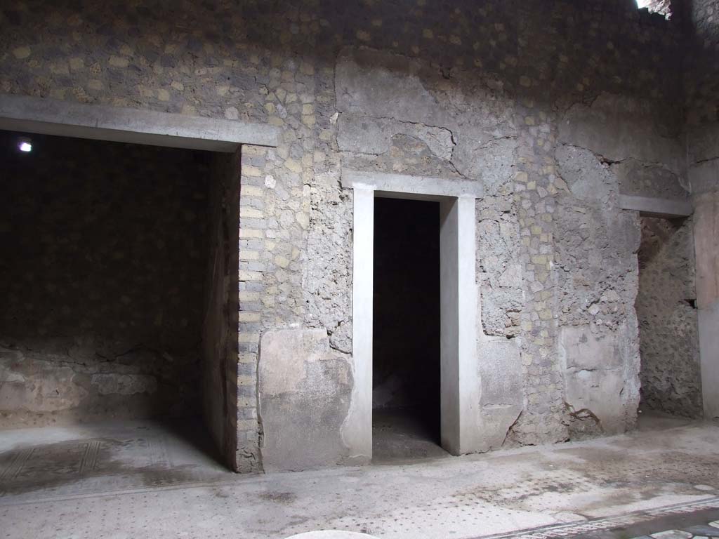 VI.8.5 Pompeii. March 2009. Room 1, west side of atrium. Doorways to rooms 10, 9 and 8.