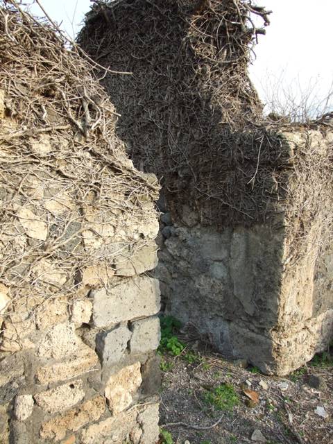 VI.11.2 Pompeii. December 2007. Site of steps to upper floor, above a room with a doorway, on left, into shop-room of VI.11.1