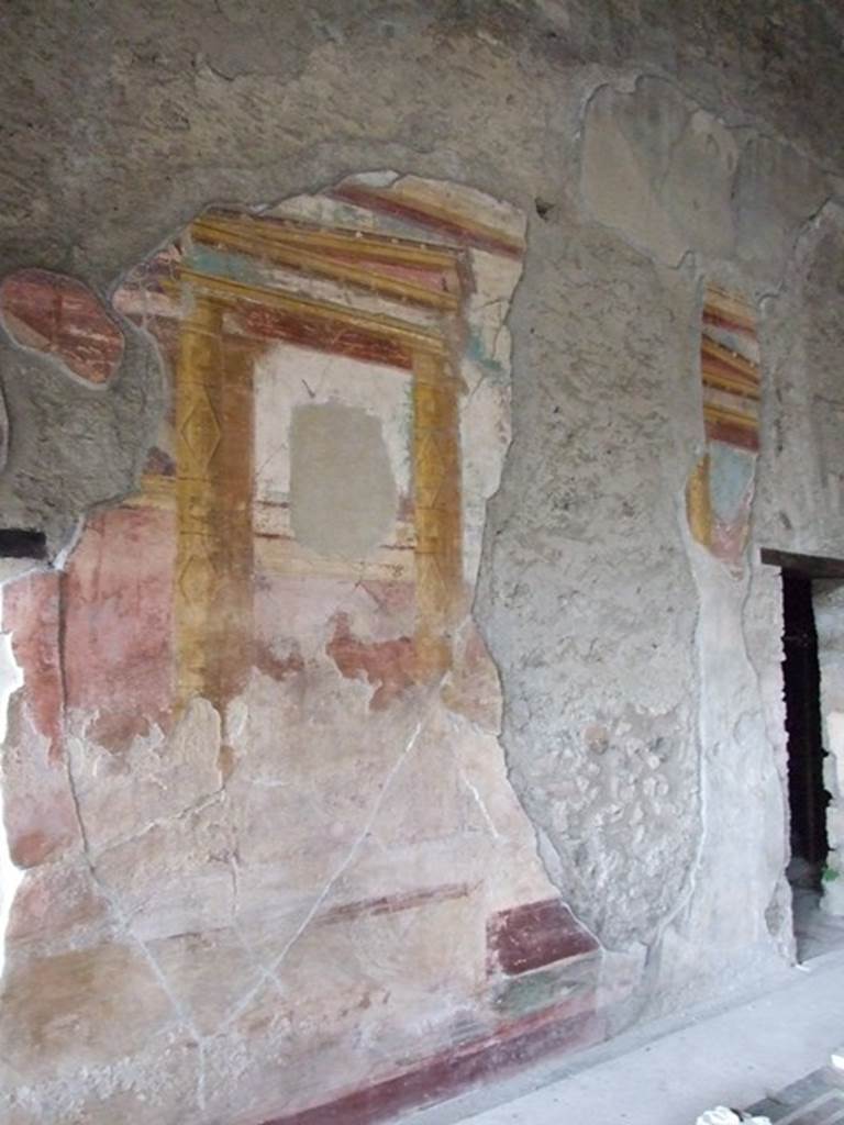 VI.11.10 Pompeii. December 2006. 
Room 43, west wall with architectural wall painting, with doorway to room 44, on right.

