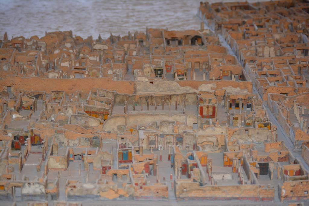VI.11.9/10 Pompeii. July 2017. Looking east across VI.9 (VI.9.6/7 lower right) towards VI.11.9/10 across the centre.
From cork model in Naples Archaeological Museum.
Foto Annette Haug, ERC Grant 681269 DCOR.

