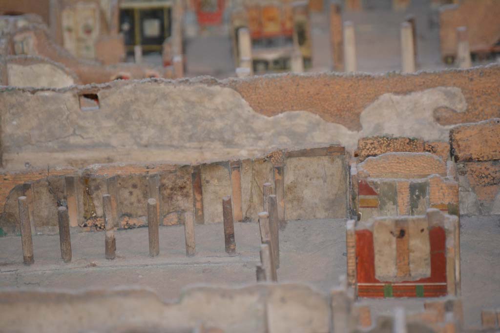VI.11.9/10 Pompeii. July 2017. Looking east towards south-east corner of peristyle 36, with walls of rooms 33 and 35, visible on right.
From cork model in Naples Archaeological Museum.
Foto Annette Haug, ERC Grant 681269 DCOR.

