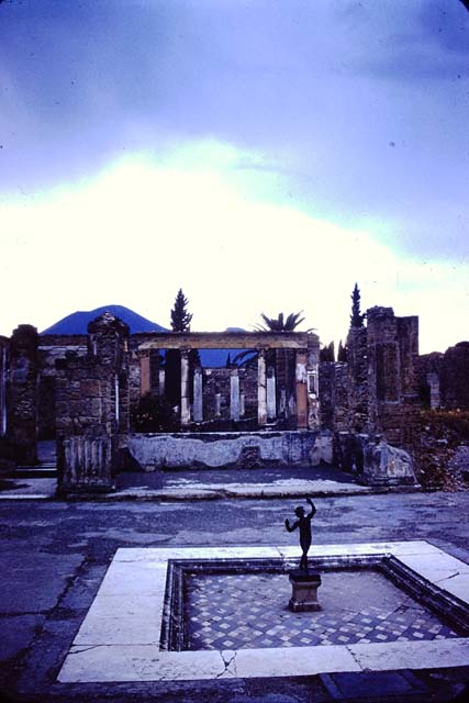 VI.12.2 Pompeii. March 1939 during a stop on SS Carinthia world cruise.  Looking north across the impluvium in atrium. Photo courtesy of Rick Bauer. 
