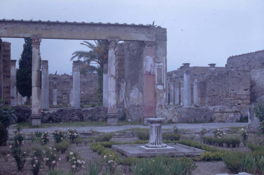 VI.12.2 Pompeii. 1945. Looking north across first garden from rear of tablinum window, towards exedra and rear peristyle. Photo courtesy of Rick Bauer.