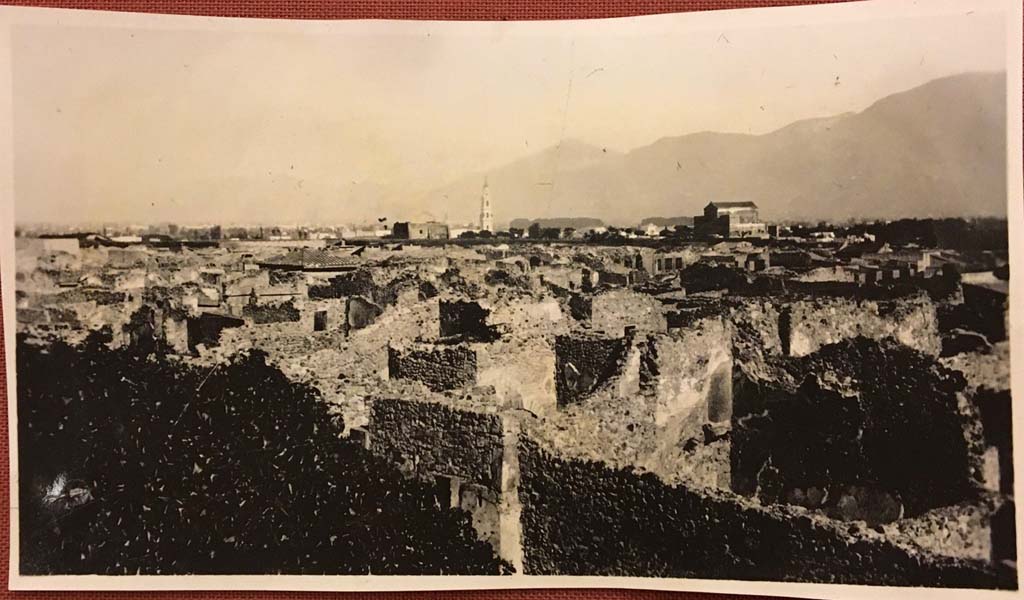 Vicolo di Mercurio, Pompeii. Photo from album dated 1928. Looking south-east across VI.14, with bakery at VI.14.34, in centre,
and rear room of VI.14.35/36, on right. Photo courtesy of Rick Bauer.
