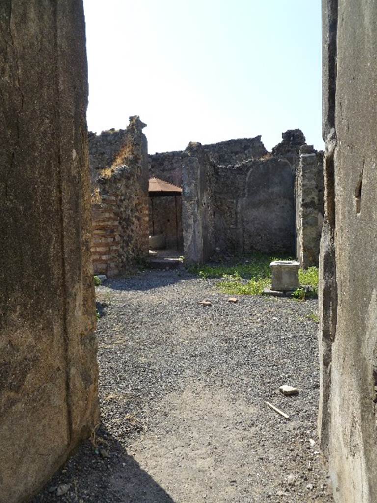 VI.14.34 Pompeii. July 2010. Entrance corridor, looking south towards tablinum.  Photo courtesy of Michael Binns.
