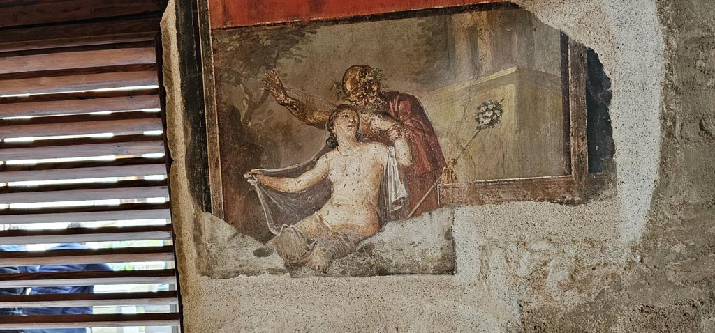 VI.15.1 Pompeii.  December 2006. Room of the Cupids or Cherubs.   Wall plaque