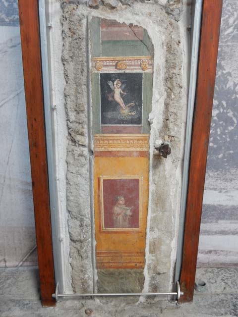 VI.15.1 Pompeii. May 2017. Painted panel on west wall of atrium, leading onto peristyle. Photo courtesy of Buzz Ferebee.
