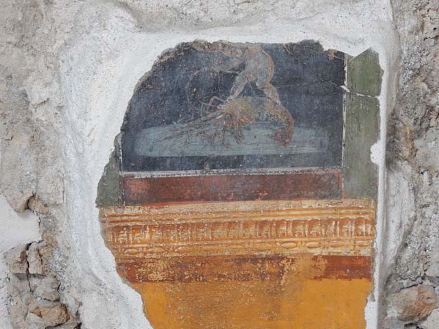 VI.15.1 Pompeii. December 2006. Detail of painting in atrium and doorway to bedroom on left of main entrance.
