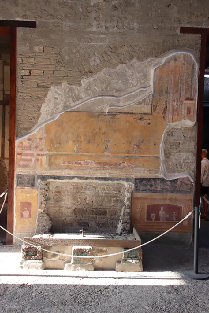 VI.15.1 Pompeii. May 2017. North side of atrium, painted panels on east side of masonry base for strongbox. Photo courtesy of Buzz Ferebee.
