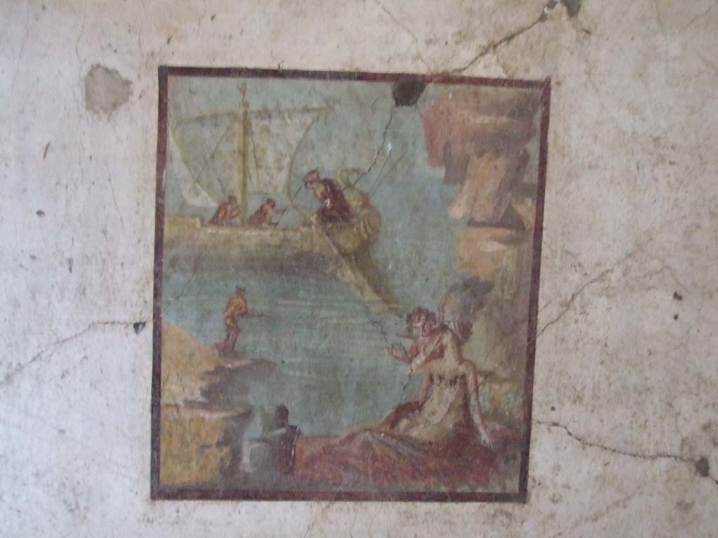 VI.15.1 Pompeii. December 2006. 
North wall with painting of Ariadne being abandoned by Theseus. Ariadne is being watched over by a cupid.
