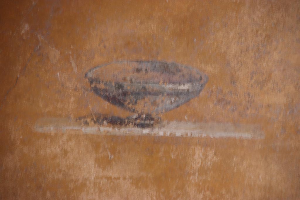 VI.15.1 Pompeii. October 2023. 
Cubiculum (d), detail from panel at north end of east wall in north-east corner. Photo courtesy of Klaus Heese.

