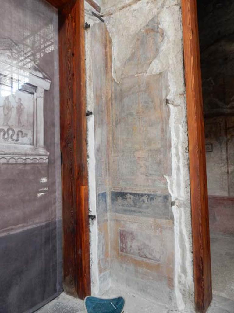 VI.15.1 Pompeii. May 2017. Looking east towards painted panels on north side of doorway to bedroom on north side of main entrance. Photo courtesy of Buzz Ferebee.

