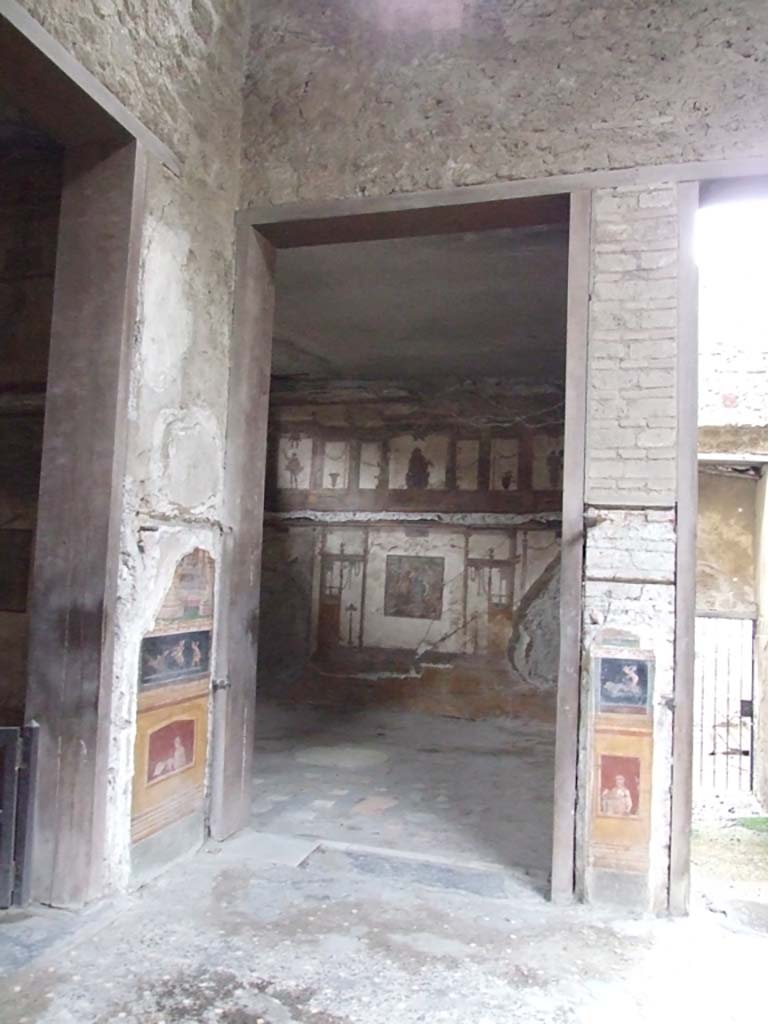 VI.15.1 Pompeii. December 2006. Doorway to oecus in south-east corner of atrium.