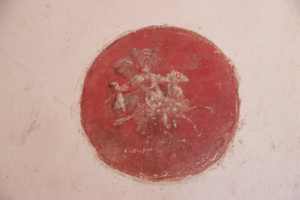 VI.15.1 Pompeii. October 2023. Decorative medallion from east wall at north end. Photo courtesy of Klaus Heese.