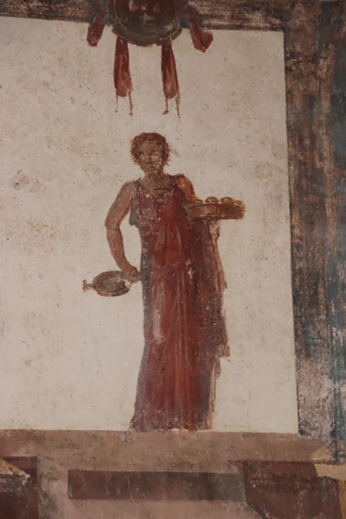 VI.15.1 Pompeii. October 2023. 
Detail of painted figure from east wall at south end. Photo courtesy of Klaus Heese.
