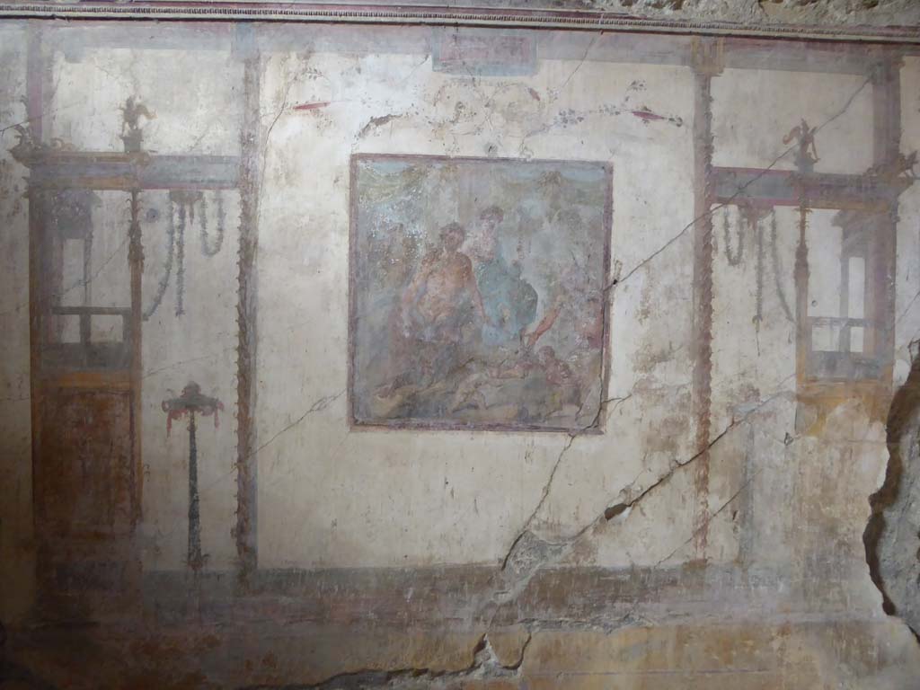 VI.15.1 Pompeii. January 2023. 
Looking towards south wall of oecus with central painting showing fight between Eros and Pan. Photo courtesy of Miriam Colomer.
